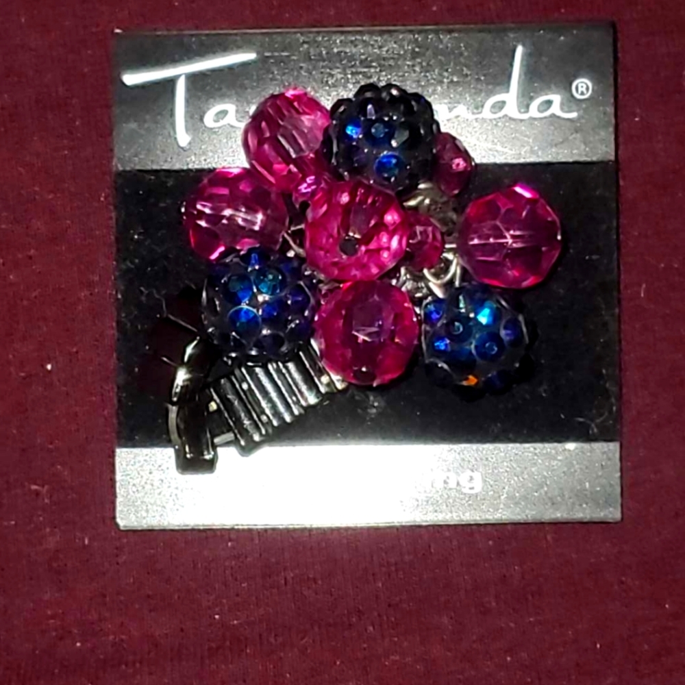 Taramanda Stretch Ring in shades of Violet/Blue/Pink.